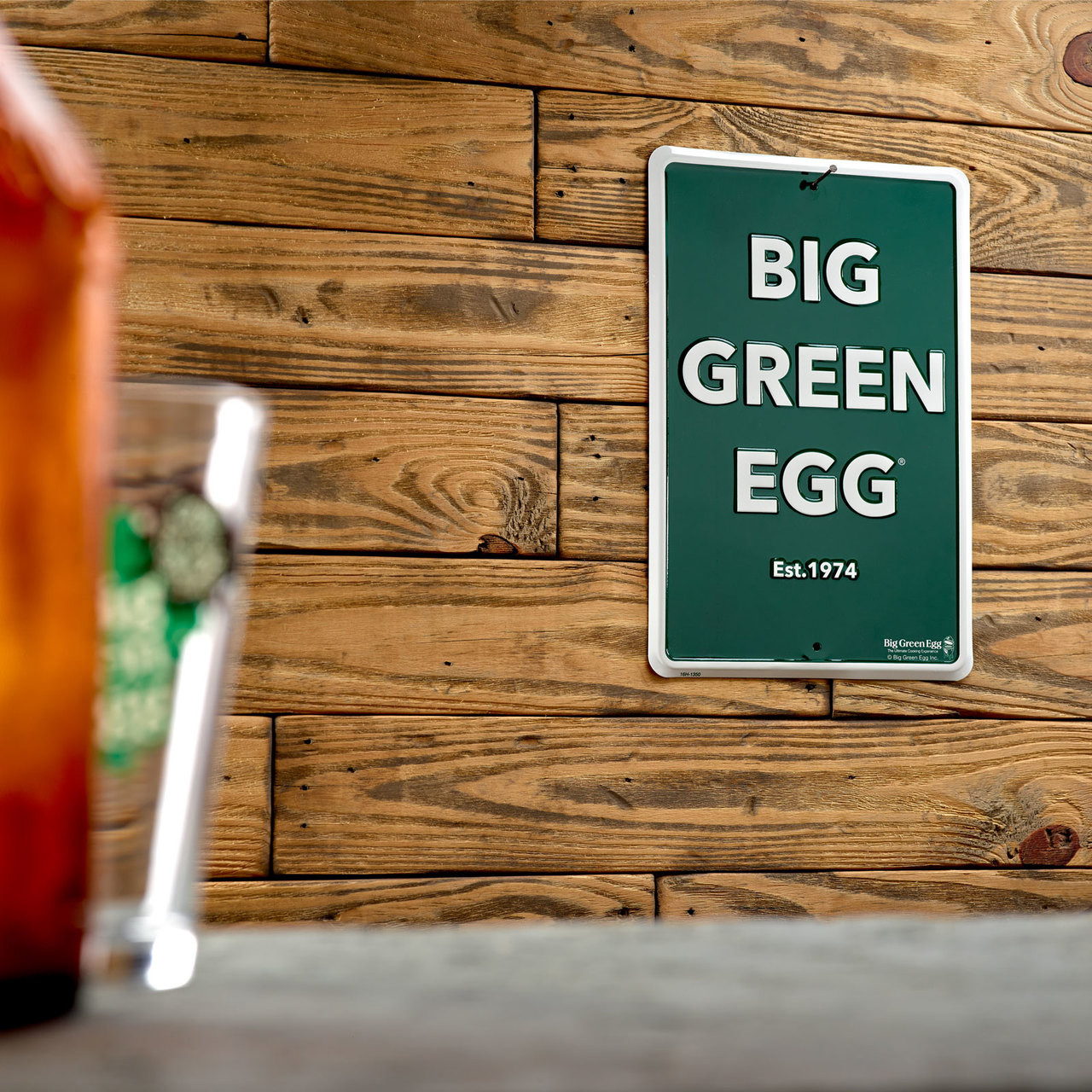 Rectangular Big Green Egg sign with raised and painted letters. "Est. 1974"