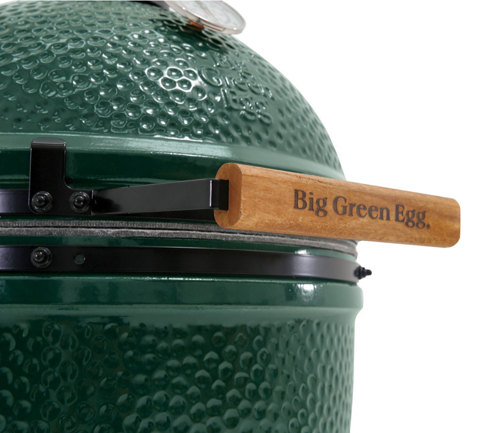 Acacia wood handle with big green egg burned in the wood