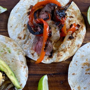 Moppin’ Sauce-Marinated Flank Steak Fajitas