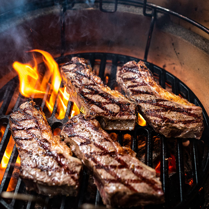 Steak on the Big Green Egg with fire